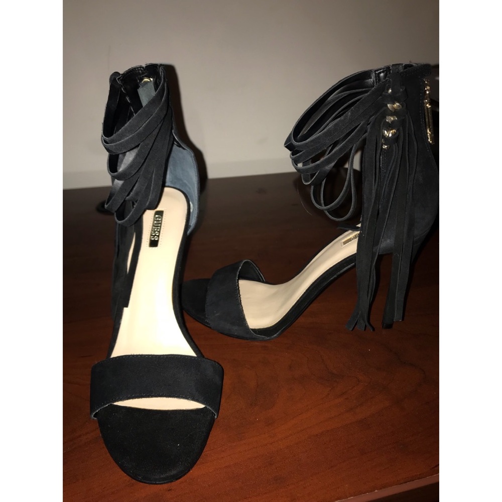 Black suede fringe heels